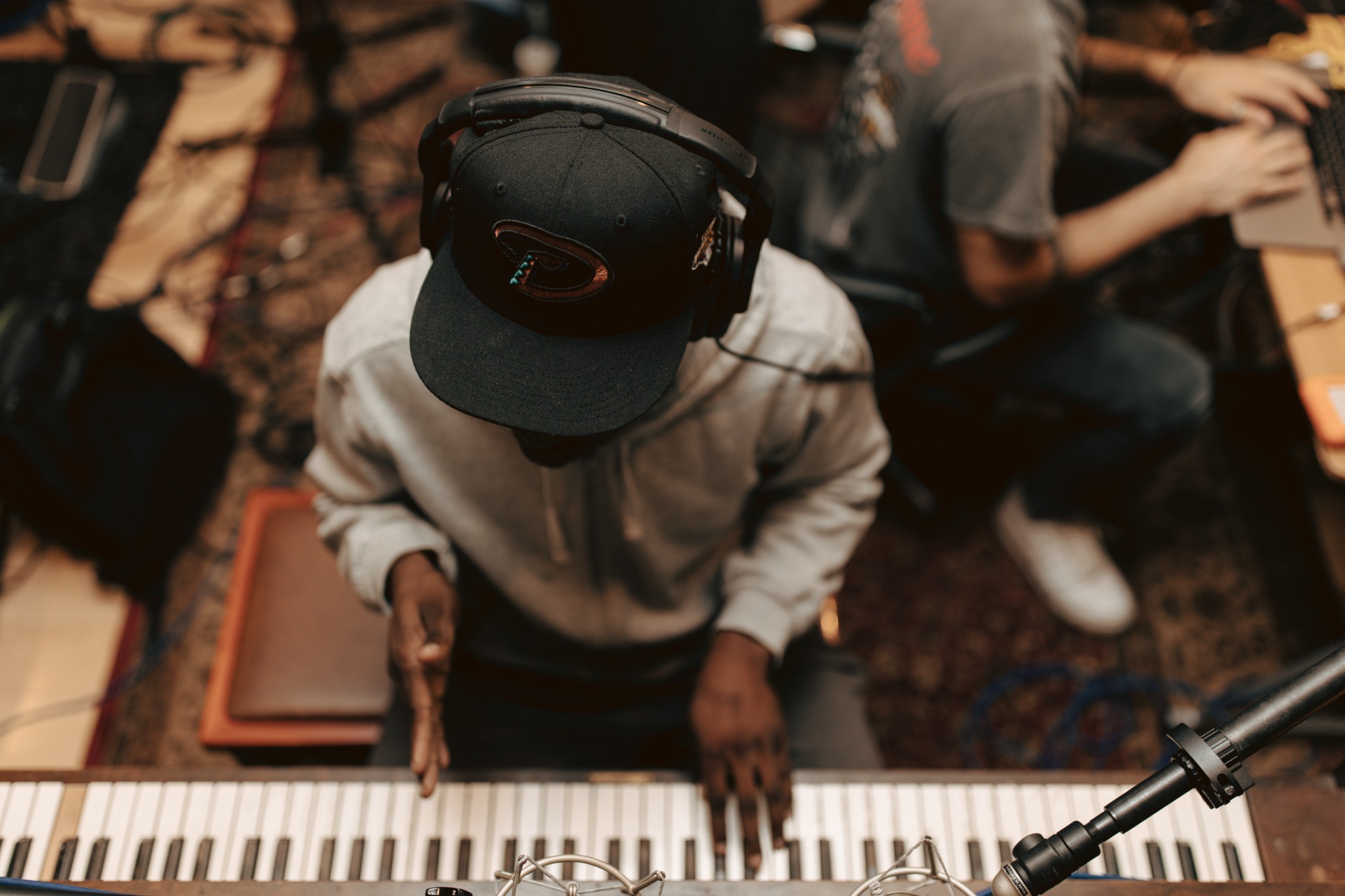an overhead view of a pianist at the keys